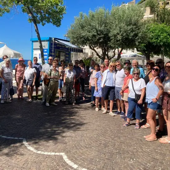 Group shot by pier in Minori waiting for boat.jpg